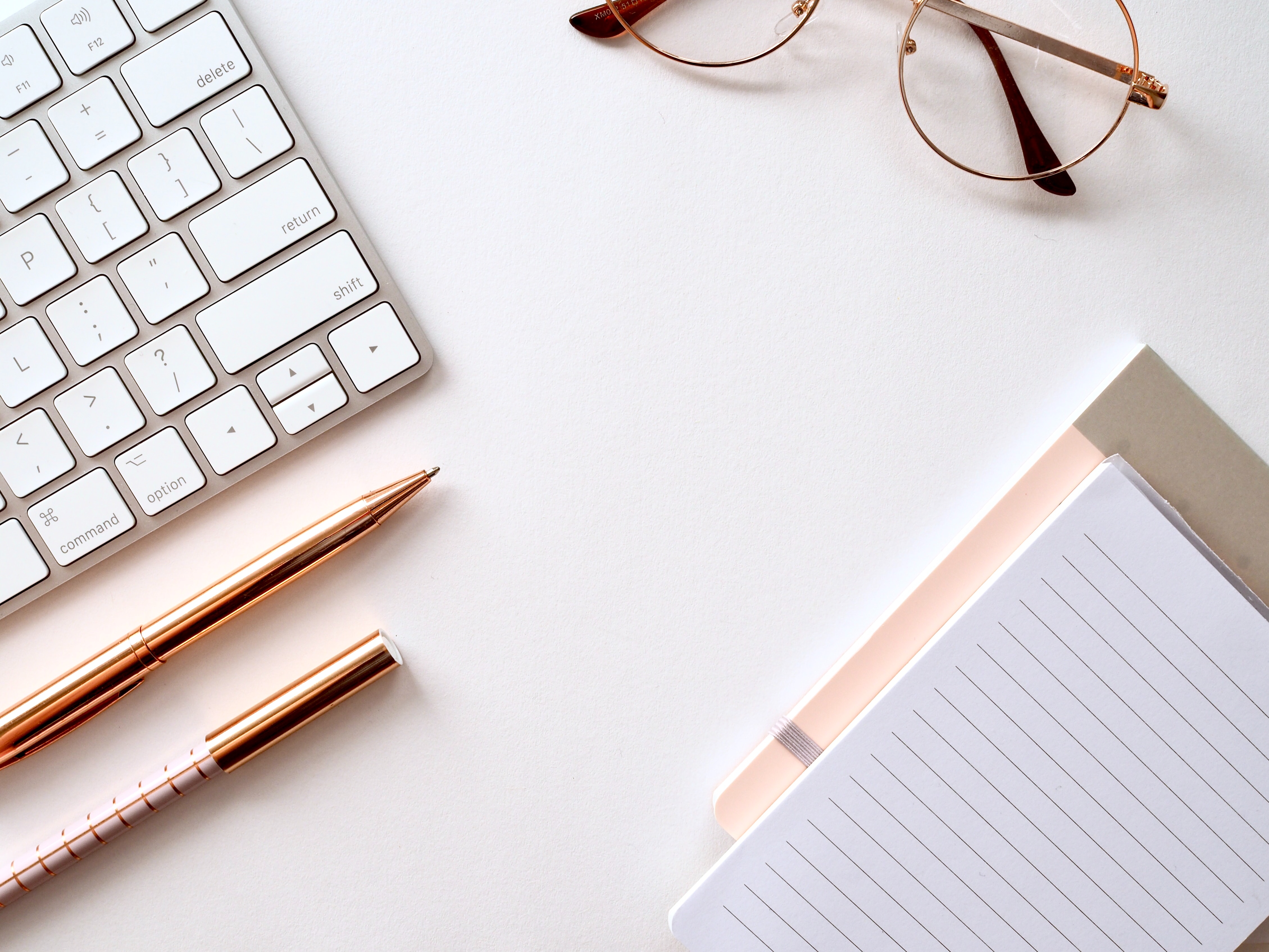 Pen-and-glasses-near-laptop (1)